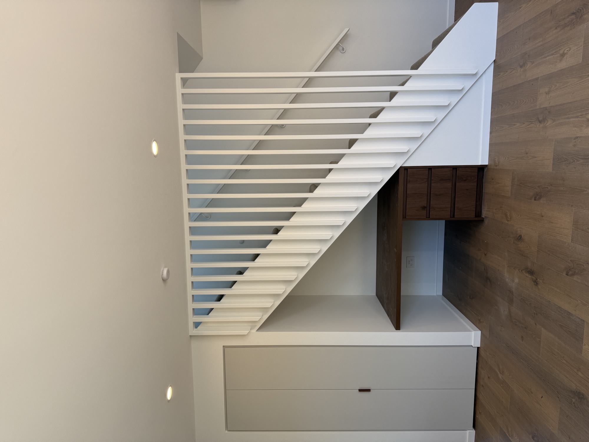 Integrated timber joinery with concealed storage